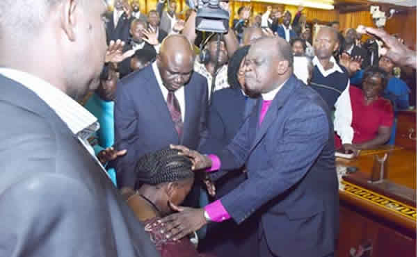 Clerics praying for speaker